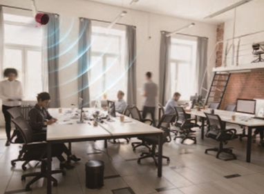 Office environment with multiple people working and ViRaTon disinfection effect shown.