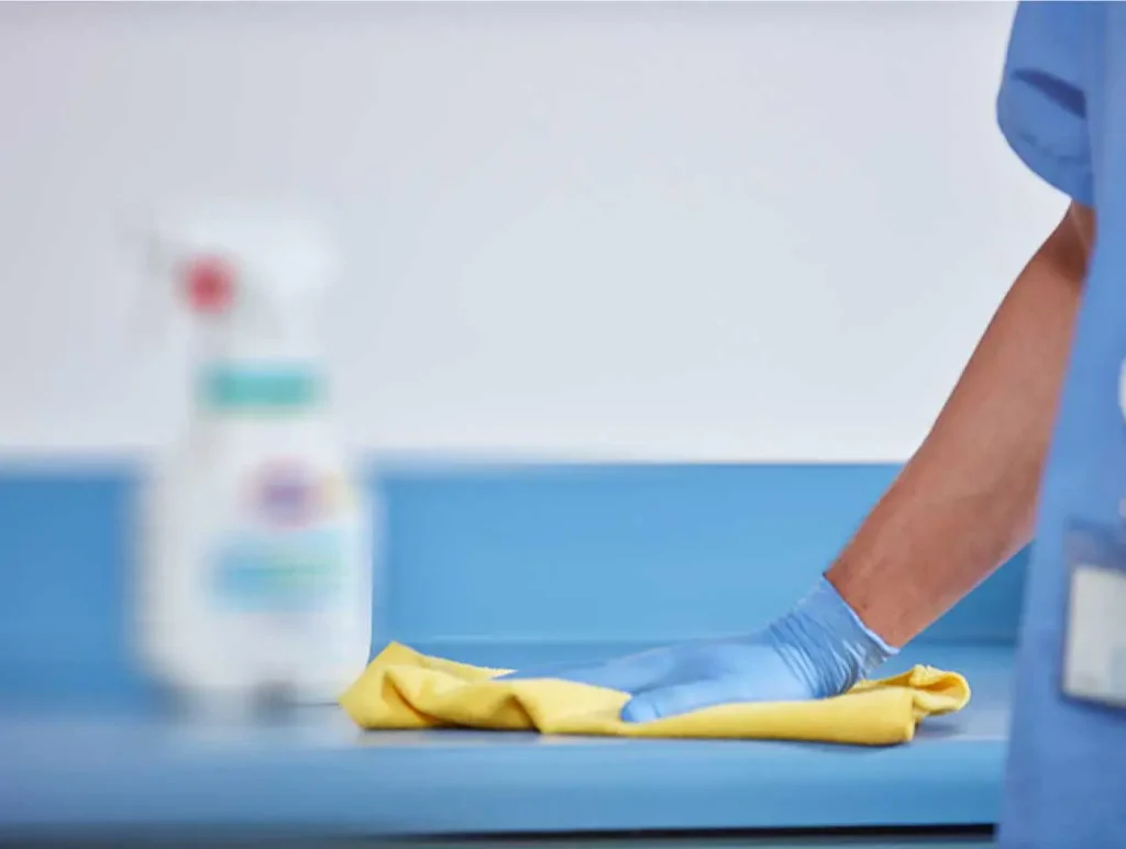 Manual cleaning process highlighting the limitations addressed by MUVi UVC disinfection systems.